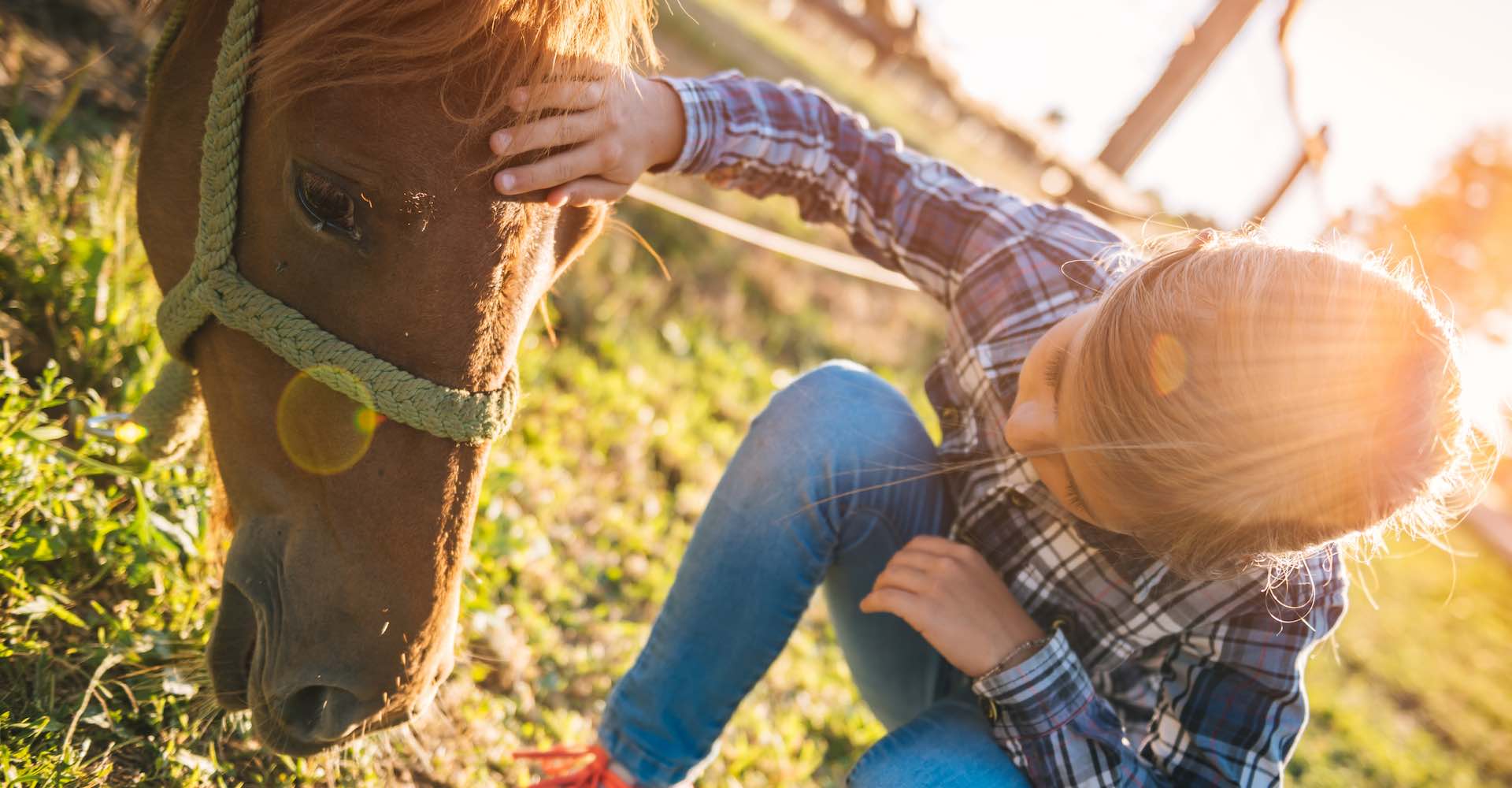 Passeggiata a cavallo in fattoria per bambini